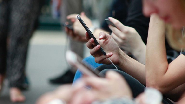People staring at phones